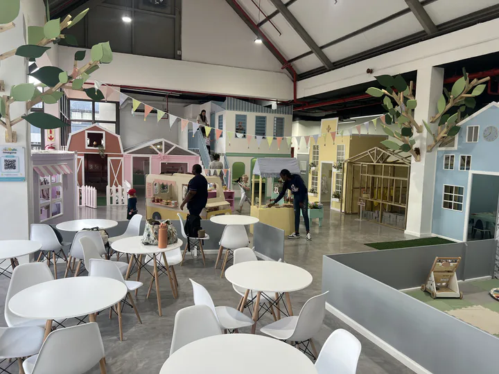 Imagine’s indoor pretend-play village and café seating