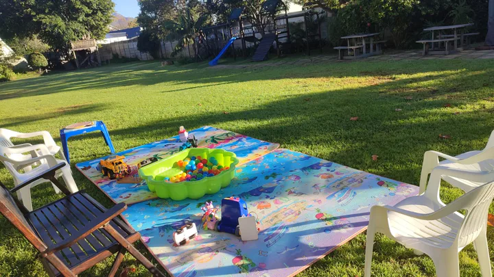 A colourful outdoor play setup at Moms Connect Tokai
